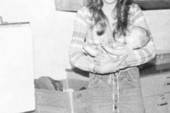 female with baby doll