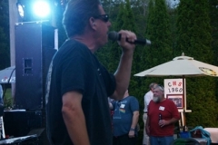 Kelly Derrick singing side view