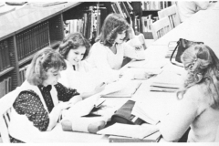 1980 Yearbook pg008 library table full of females