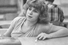 1980 Yearbook pg033 female at caf table