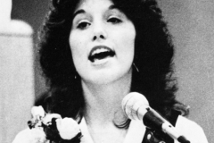 1980 Yearbook pg088 Lina Tomba behind podium